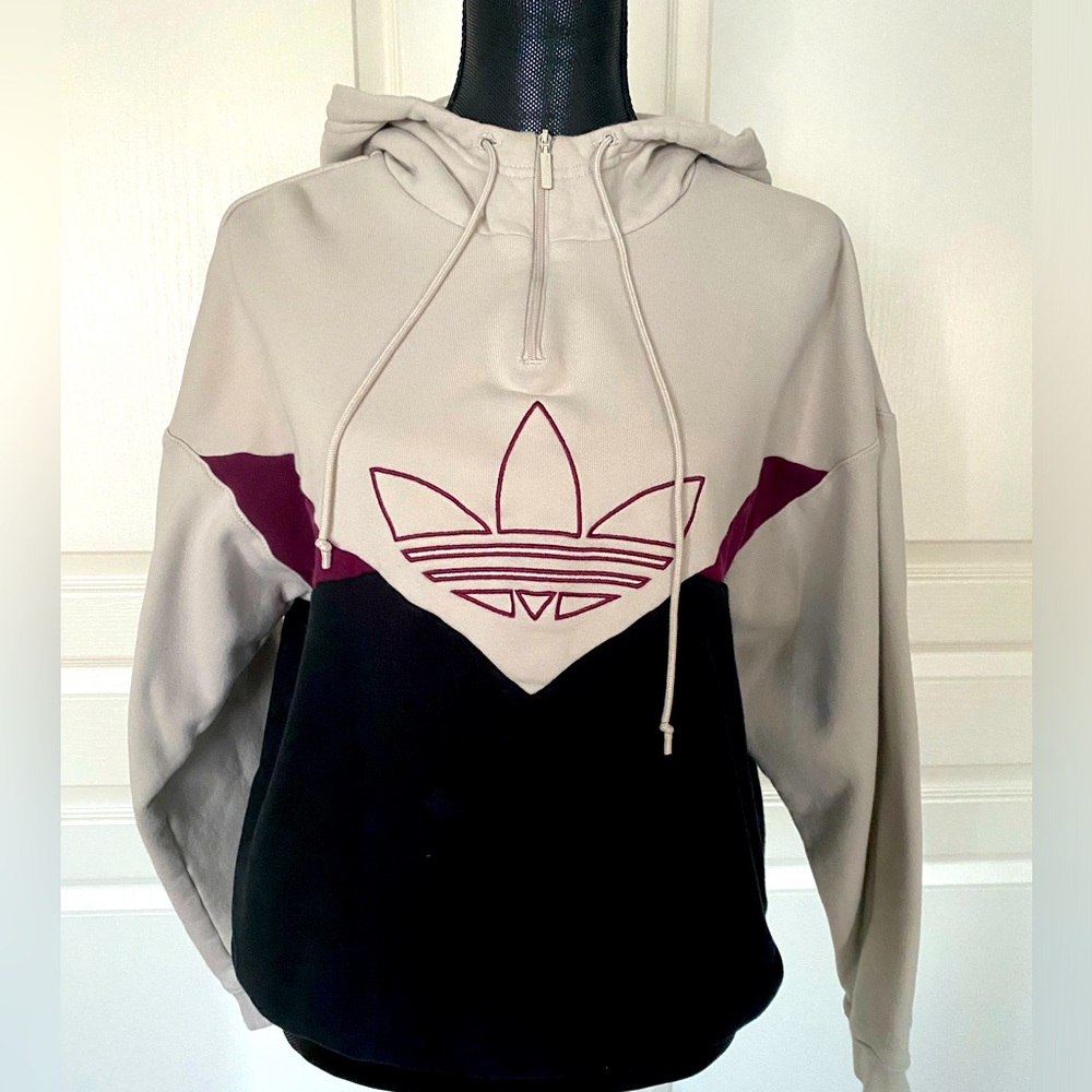 Adidas sweat top with hood.